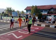 Pagi Penuh Semangat, AKP Remanto Turun ke Jalan Pastikan Keselamatan Anak Sekolah