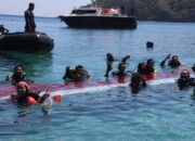 Upacara Pengibaran Bendera Merah Putih di Dasar Laut Pantai Nipah: Kombes Pol Andree Ghama Putra Pimpin Rangkaian HUT RI ke-79