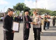 Wujudkan Pilkada Damai Polres Loteng Laksanakan Apel Satkamling